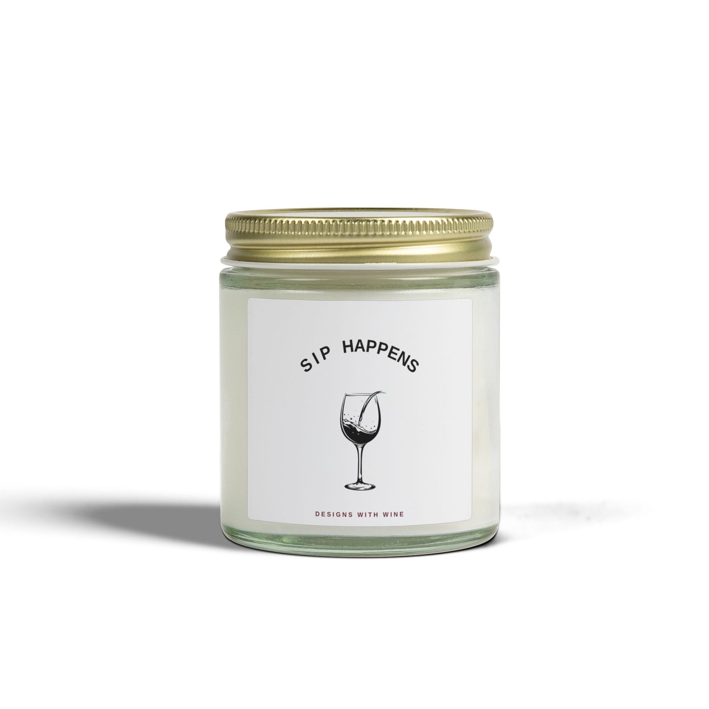 Sip Happens 4oz scented candle - clear glass jar, gold lid, wine glass label, front view