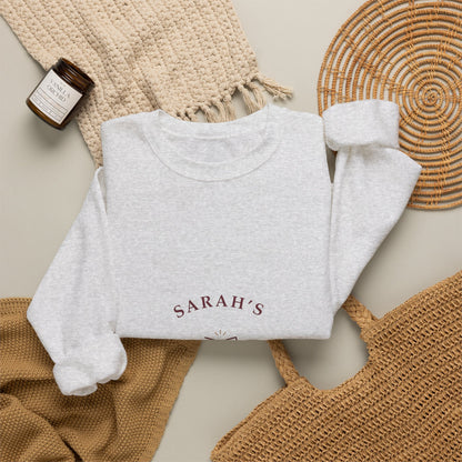Ash grey personalized crewneck styled flat with a lit candle and wine accessories