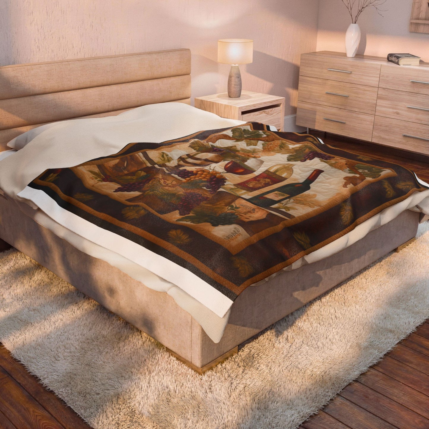 Quilted Vines plush blanket spread over a bed in a bedroom with a dresser, lamp and rug