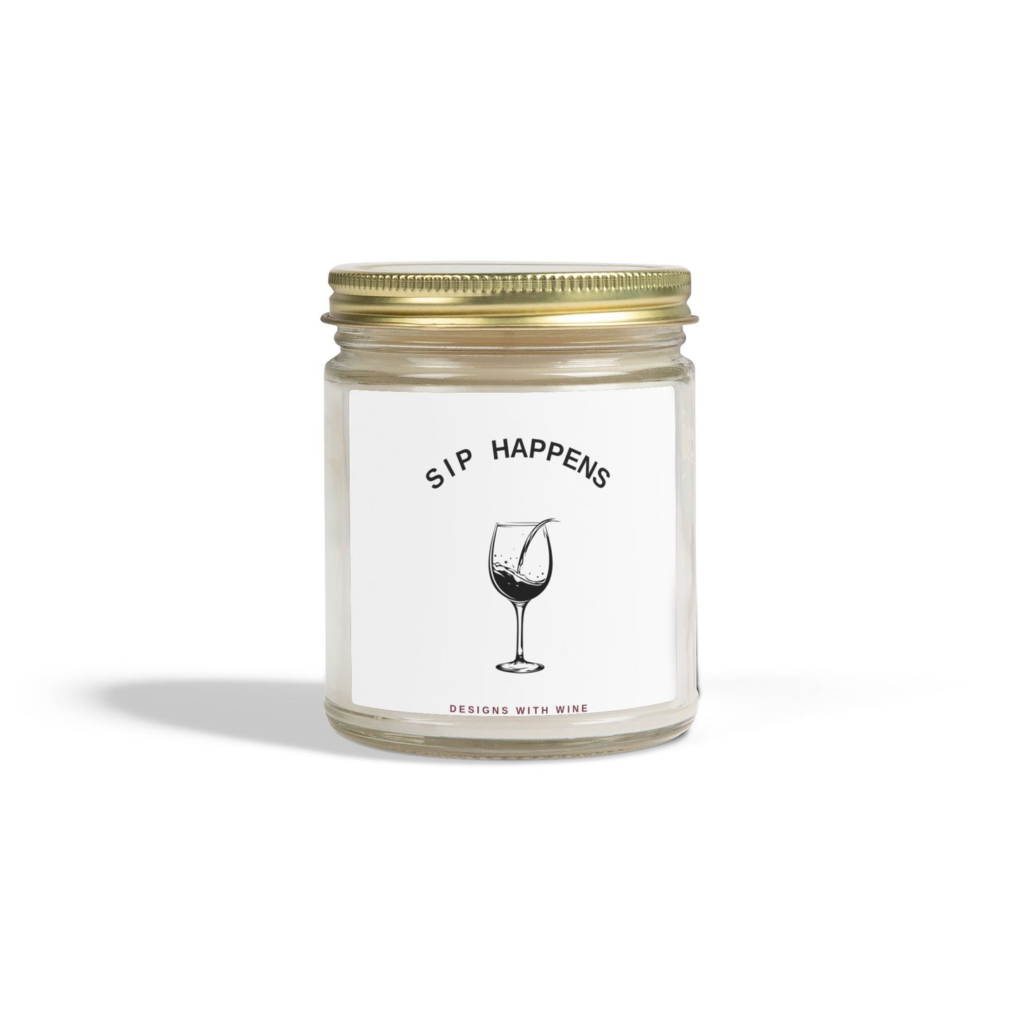 Sip Happens 9oz scented candle - taller clear glass jar with gold lid, front view