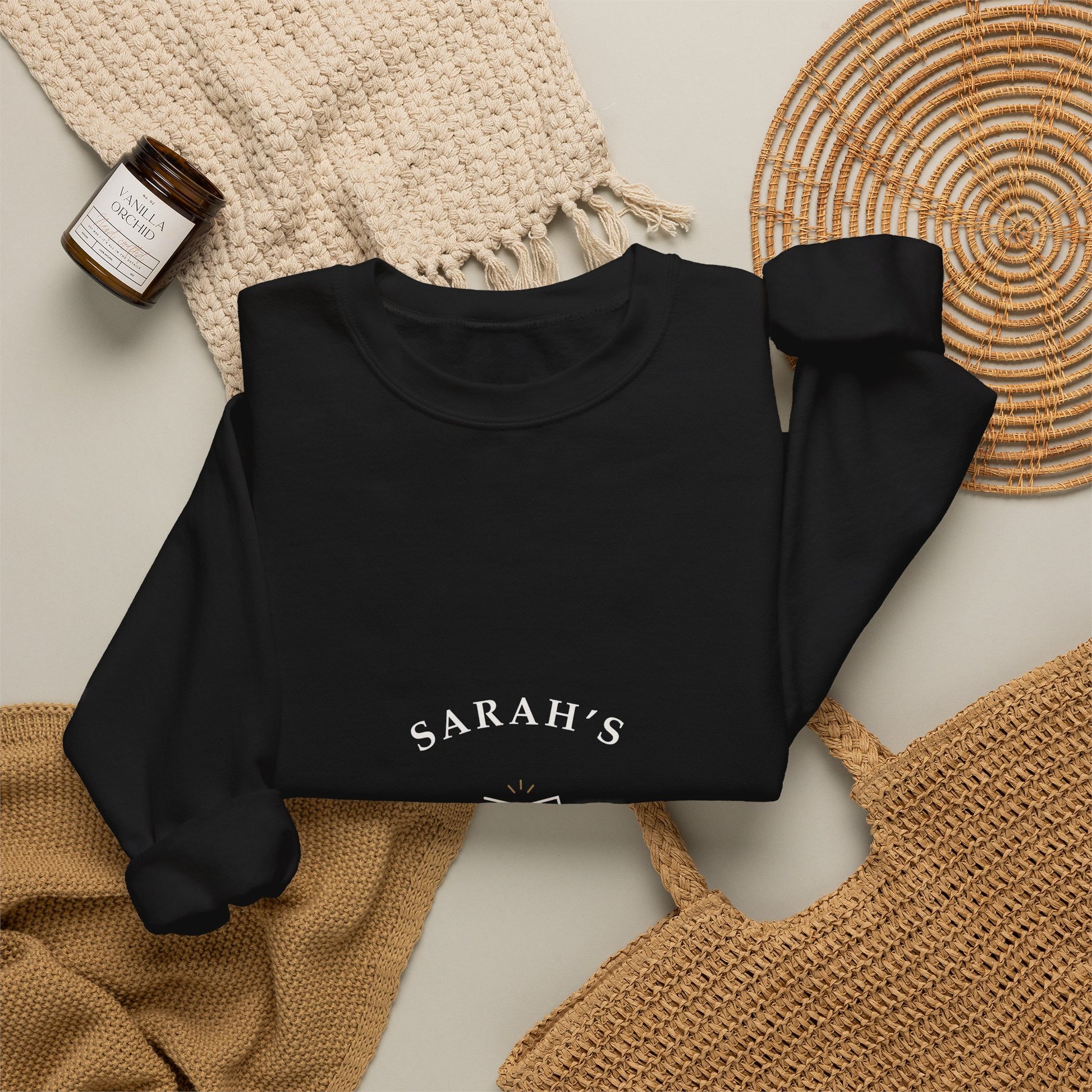 Black personalized crewneck styled flat with wine-themed props