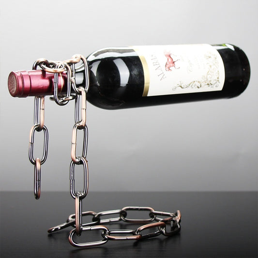 Iron chain wine rack holding a bottle in a floating illusion