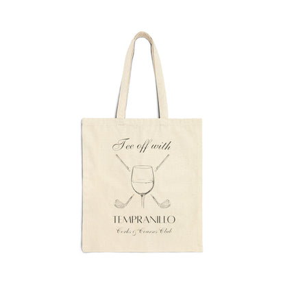 Wine and golf crossover design printed on a natural canvas tote bag