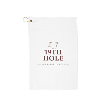 The 19th Hole golf towel by Designs With Wine, wine-red serif type with a gold flagstick and wine glass on white microfiber