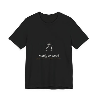 Black unisex cotton tee printed with cream hand-lettered Pour Decisions Since artwork personalized with two names and a date