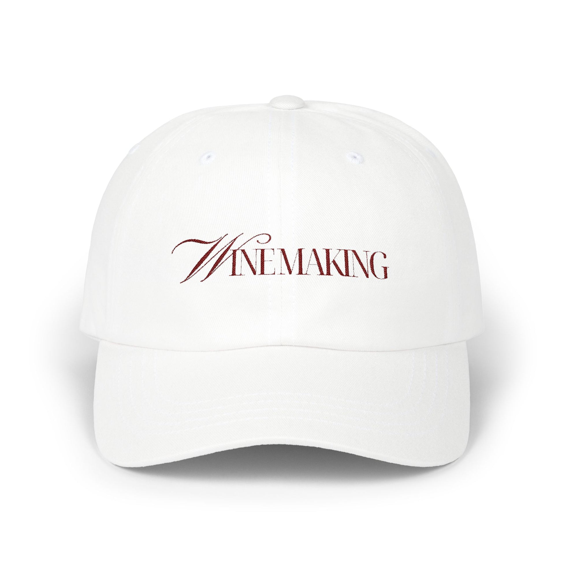 Winemaking vintage editorial logotype in red thread on a cotton classic cap