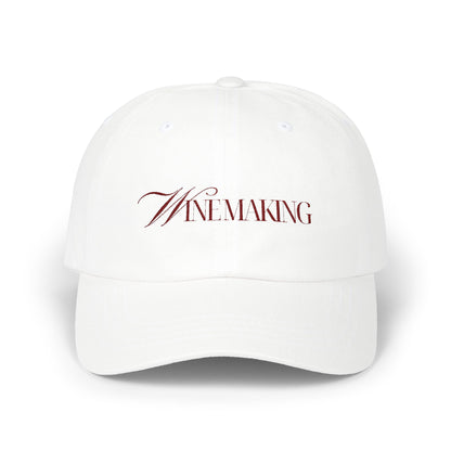 Winemaking vintage editorial logotype in red thread on a cotton classic cap
