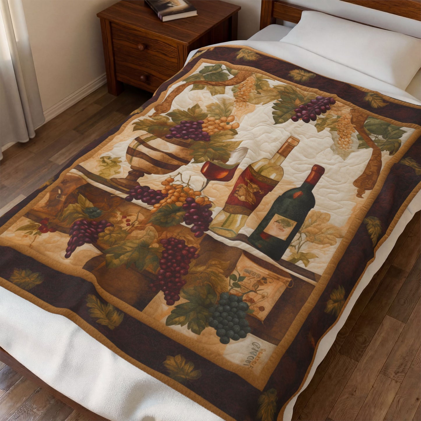 Quilted Vines plush blanket draped over a bed, close view of the grape and wine bottle panel