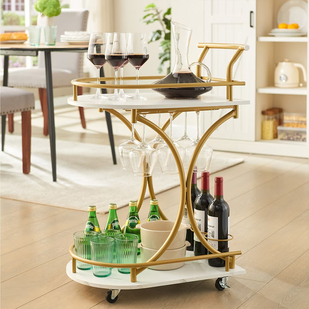 Gold two-tier rolling bar cart with faux marble shelves and wine rack