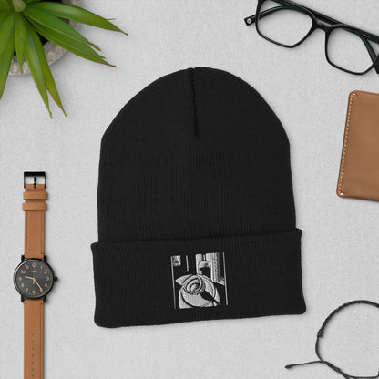 Abstract wine embroidery on a cuffed knit beanie